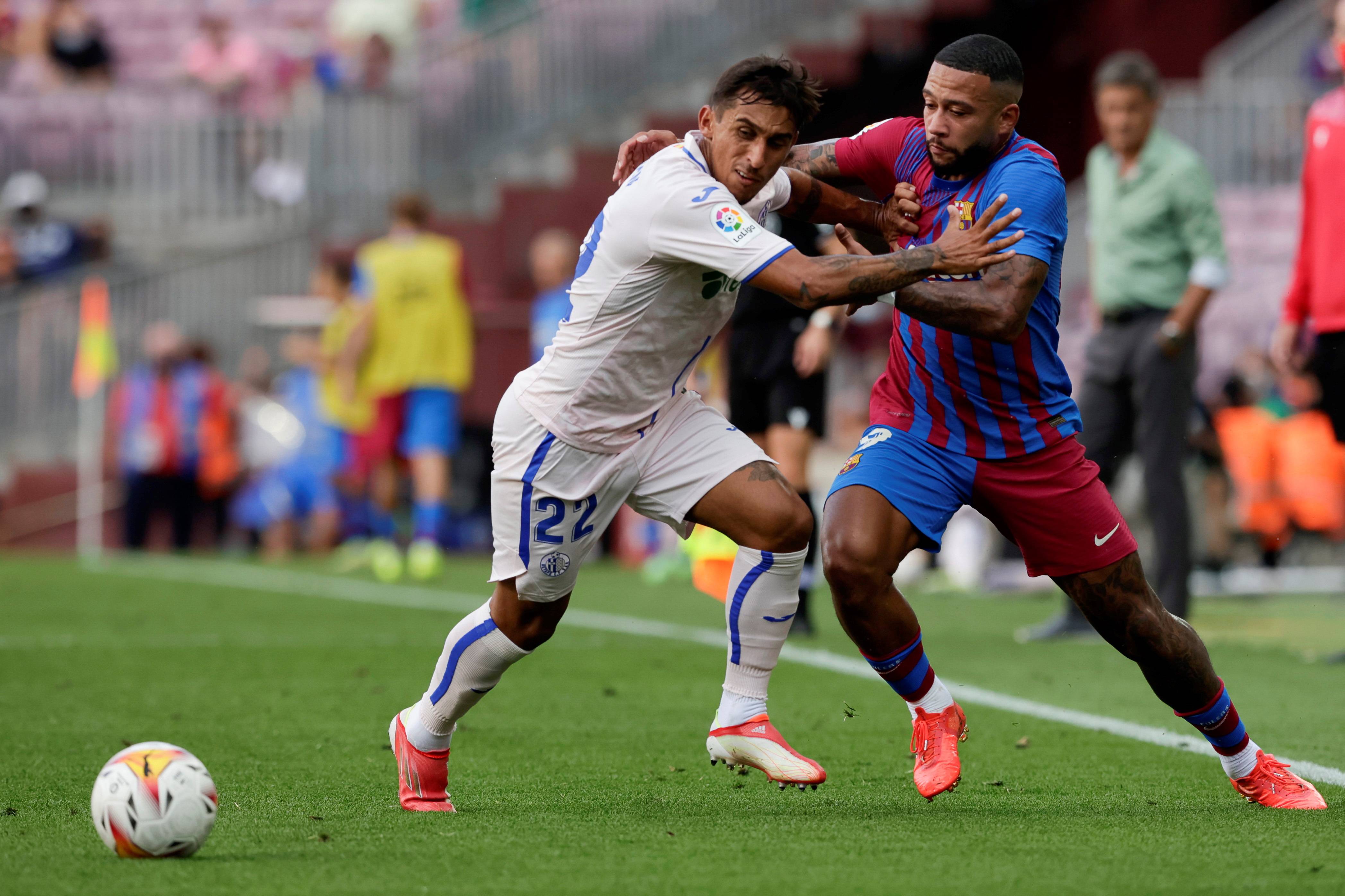 赫塔菲险胜巴塞罗那，球迷狂欢不止(皇马对巴塞罗那直播视频)